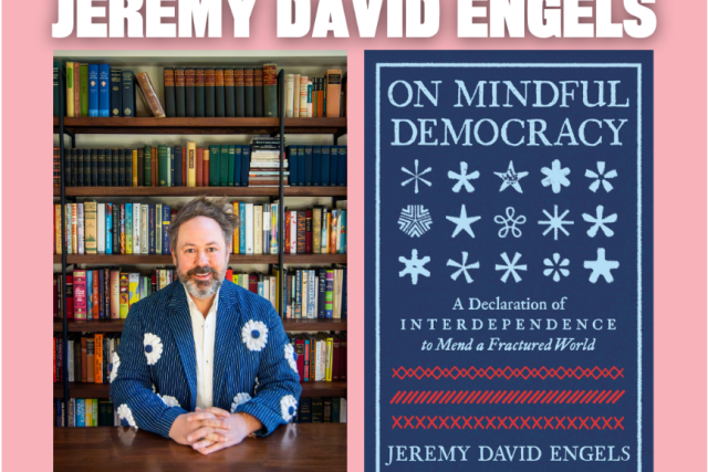 Jeremy David Engels sits before bookshelves, next to his book "On Mindful Democracy."