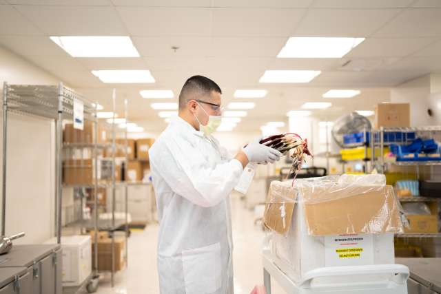 lab technician, unpacks the units and stores Bermeo’s unit in a refrigerator