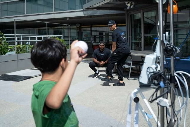 Mookie Betts is challenged by patient at UCLA Mattel Children's Hospital