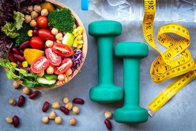 Salad bowl, dumbbells, water bottle, measuring tape and supplements