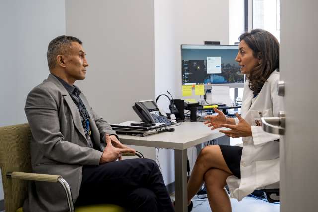 Psychiatrist Consulting with Patient 