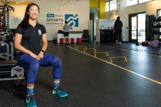 Deviny at Exos UCLA training facility smiling in workout area