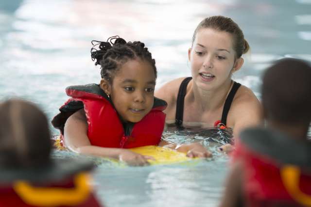 Children learning how to swim