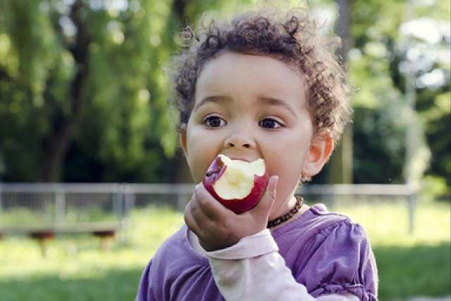 Boy with apple