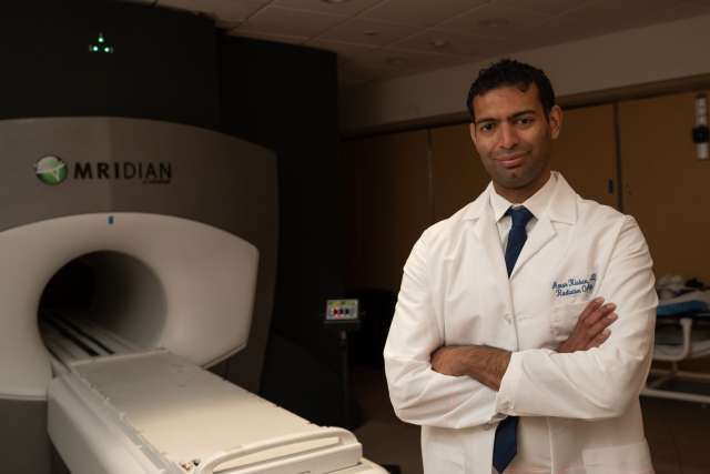 Doctor in front of MRI