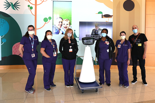 Robin the robot with members of hospital staff