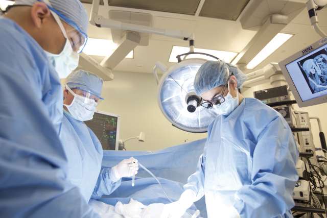Surgeons in operating room