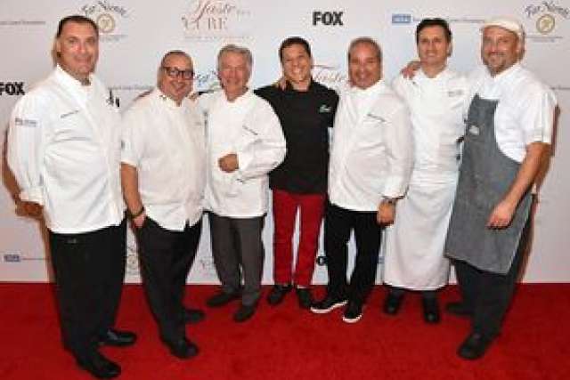 Chefs pose together on the red carpet for Taste for a Cure 2015