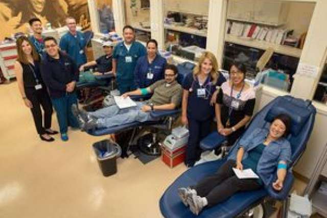 Staff and volunteers celebrate at UCLA Blood and Platelet Center's 40th anniversary event.