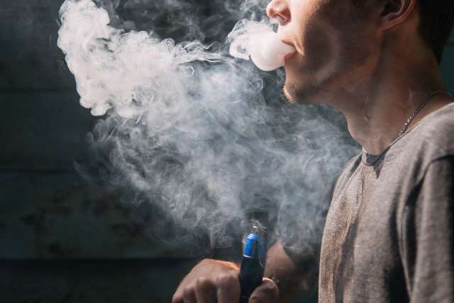 man vaping