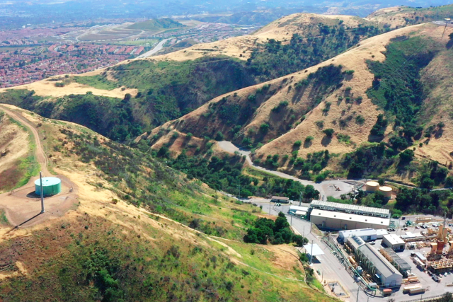 Aliso Canyon gas storage facility in the right foreground with the Porter Ranch neighborhood in the left background.