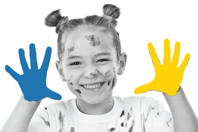 A black and white image of a little girl showing her hands, one painted yellow and the other one blue.