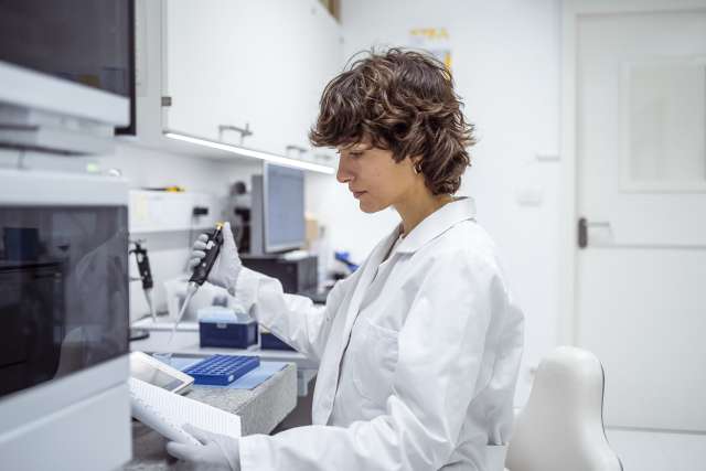A female researcher working in the lab