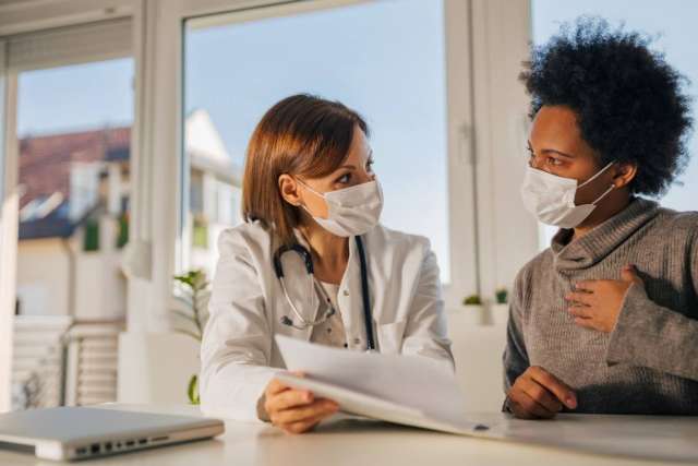 Doctor discussing treatment with patient