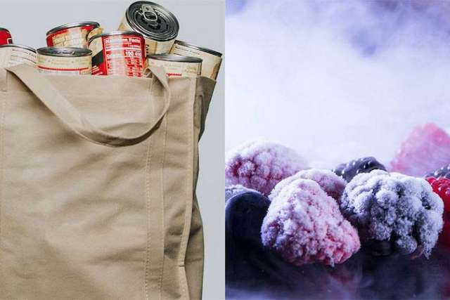 A tote bag with canned goods on one side, frozen berries on the other.