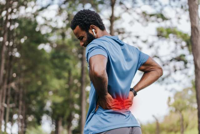 man with back pain blog