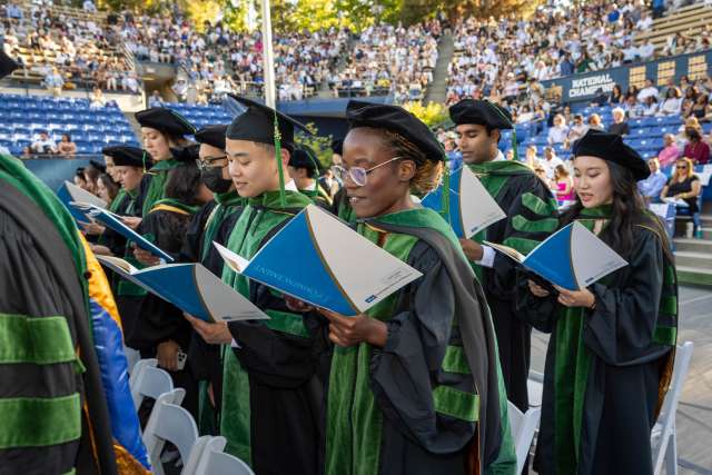 Graduating medical students read the Hippocratic oath at the UCLA campus.