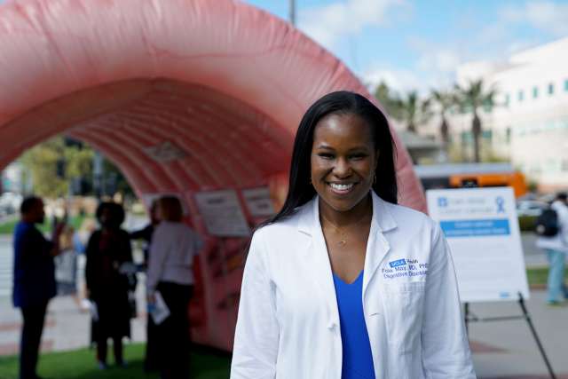 UCLA's Dr. Fola May at a colorectal cancer screening community event