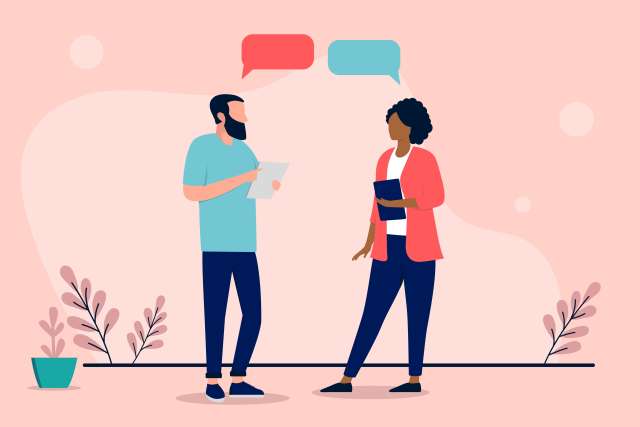 Two people conversing with speech bubbles above them