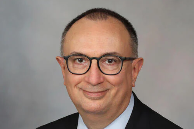 Headshot of Dr. Kenneth Warrington.