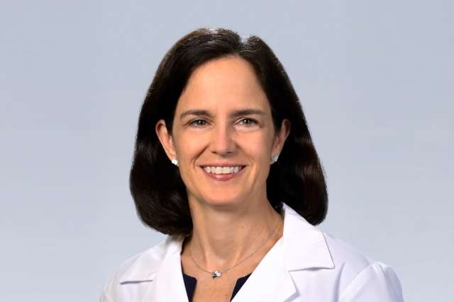Headshot of a Dr. Susan Domchek in a white lab coat
