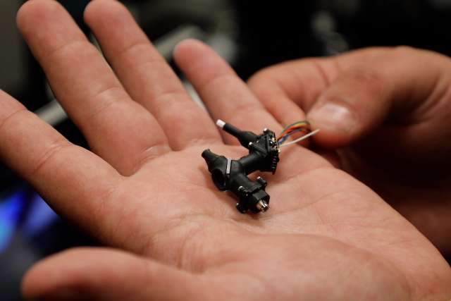 A current version of the “miniscope” developed by UCLA researchers.