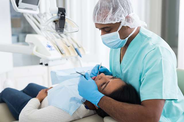 Patient receiving dental treatment