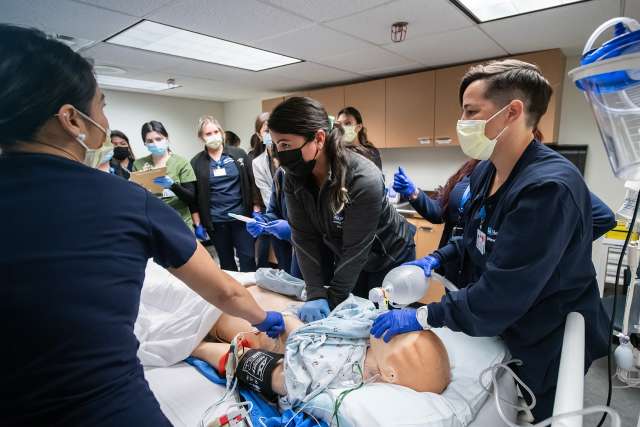 Team of nurses in training exercise