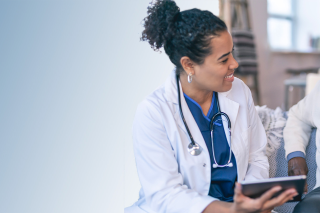 Geriatrician with patient