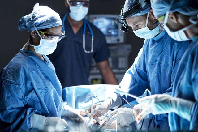 Doctors performing operation