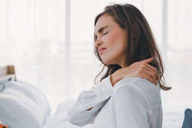 Woman with neck pain