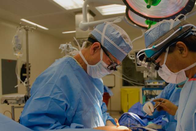Surgery being performed in operation room