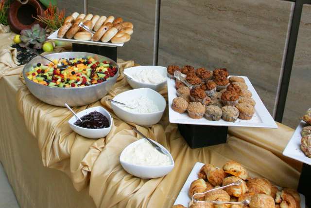 Banquet table filled with catered food