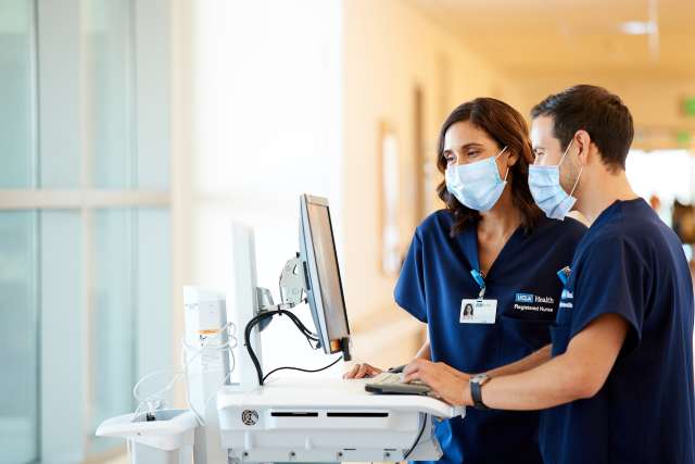 UCLA Health nurses at a computer