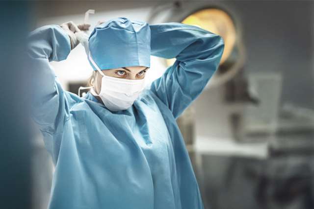 female surgeon in operation room