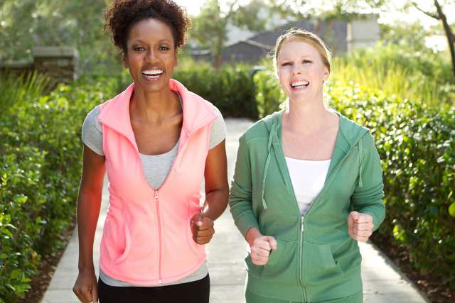 Two women jogging in the park