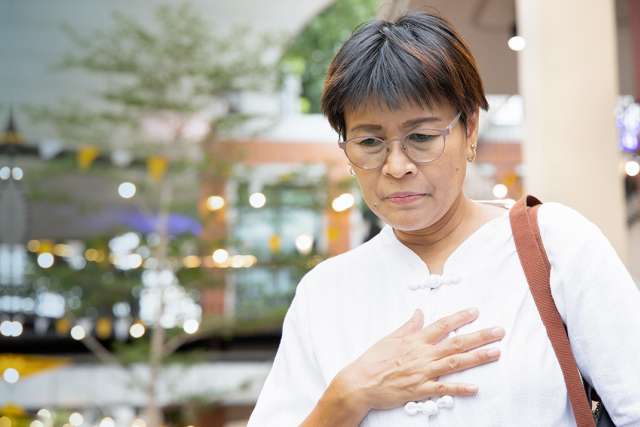 Woman with esophageal pain