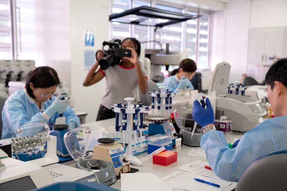 Behind the scenes of a video shoot in the UCLA Jonsson Cancer Center Genomics Shared Resource