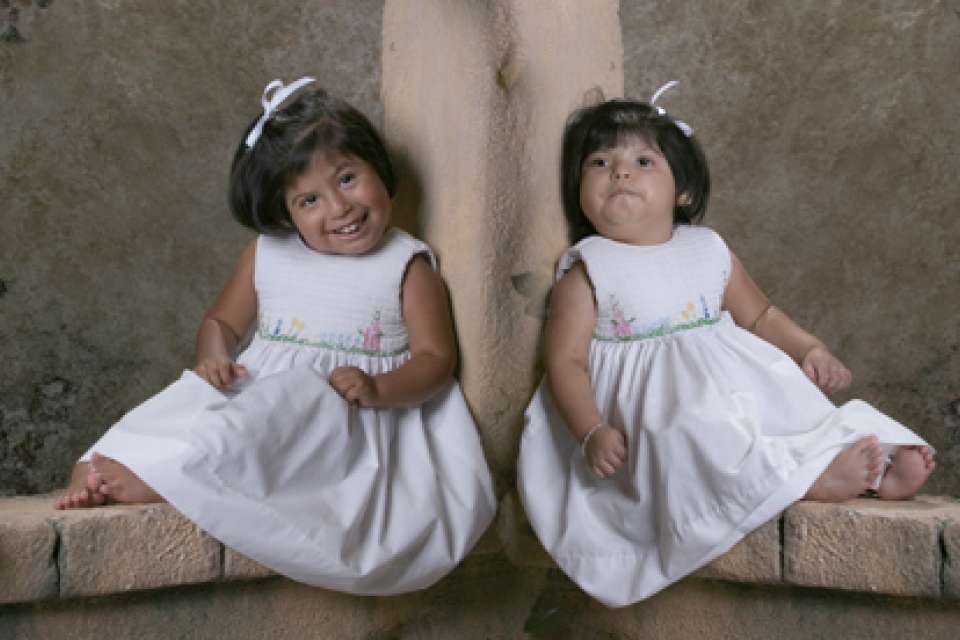 Maria twins in white dresses