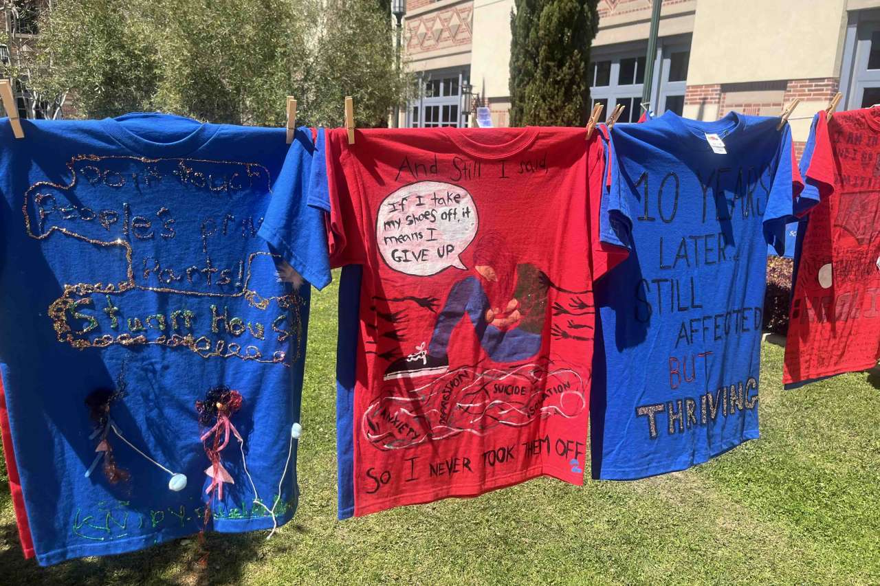 T-shirts are on display in the Clothesline Project exhibit.