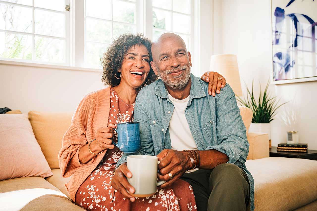 Older couple sitting on couch