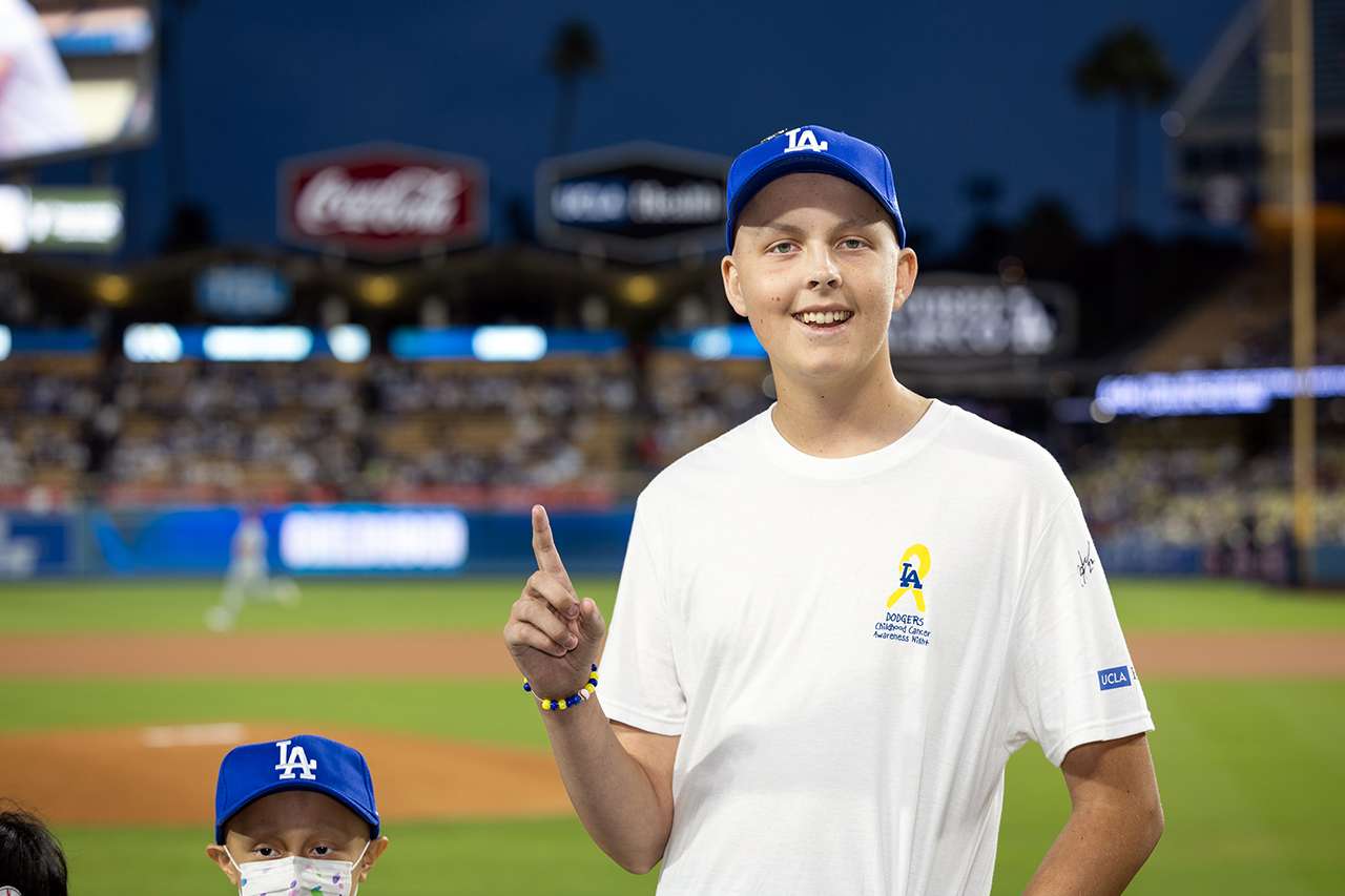 A young cancer patient earned the honor of throwing out the first pitch.