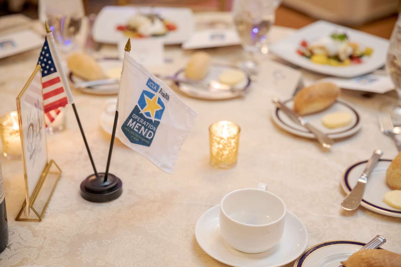 Operation Mend Flag and American Flag on banquet table
