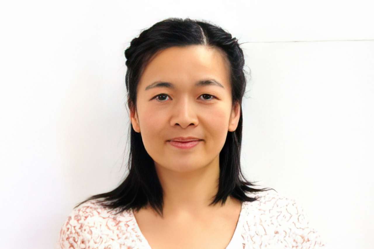 Headshot of Dr. Yahzen zhu facing camera, neutral expression