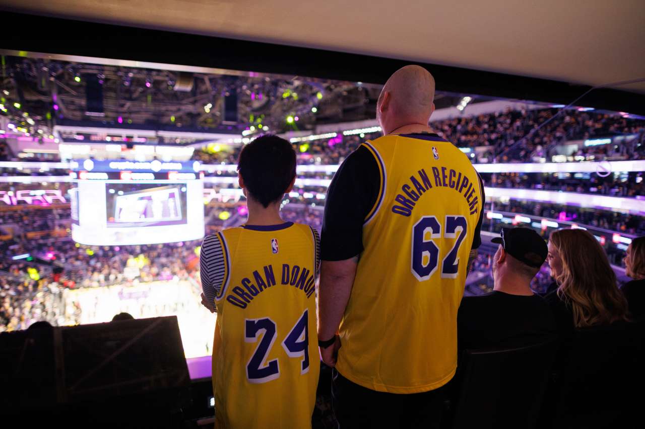 Cynthia Palmquist and Everett Verigan were donor and recipient Lakers jerseys