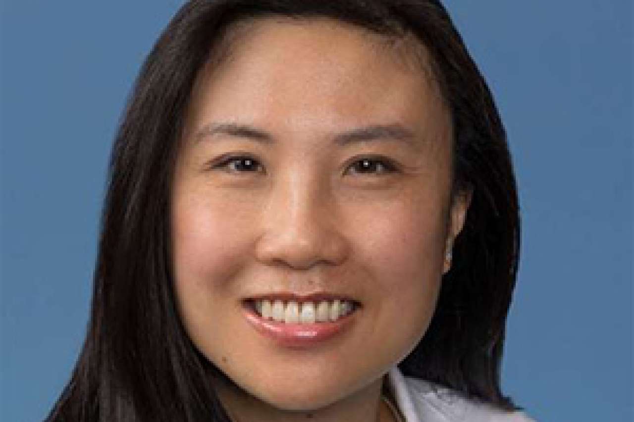 headshot of Kara Chew in white coat