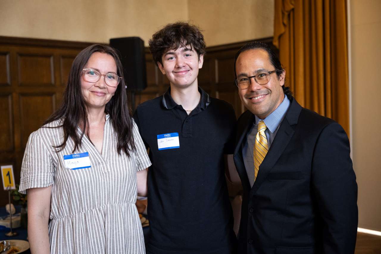 Luka Simunac poses for a photo with his mom, Maya Polimac, and Dr. Satiro De Oliveira, his pediatric hematologist 