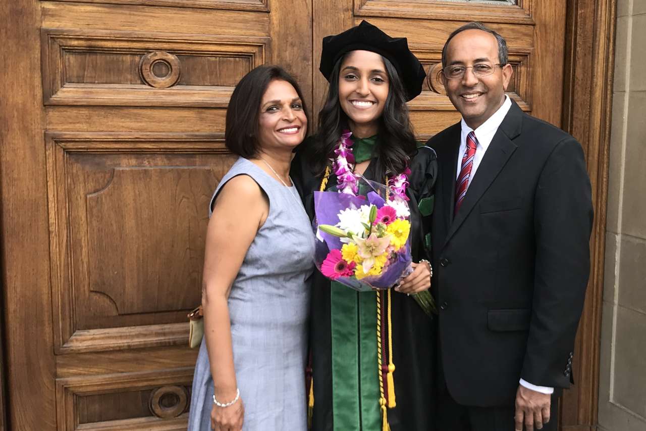 Graduation photo of Dr. Amie Patel with her parents