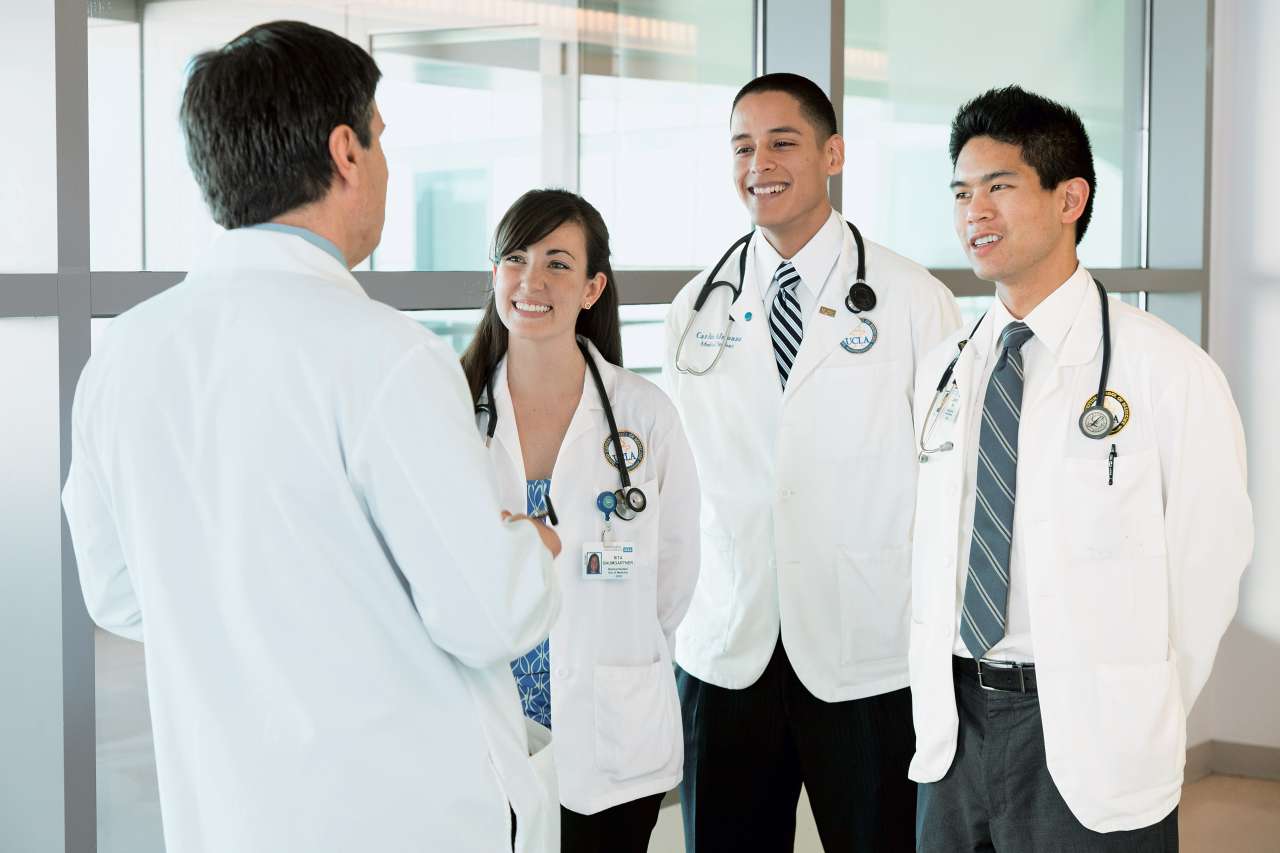 Doctor talking to students