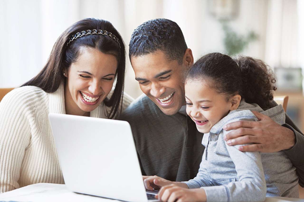 Family at laptop